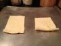 Separate dough into two triangles/rolls per pizza