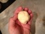 Roll dough into a ball and flatten on pan