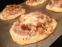 Cooked pizzas